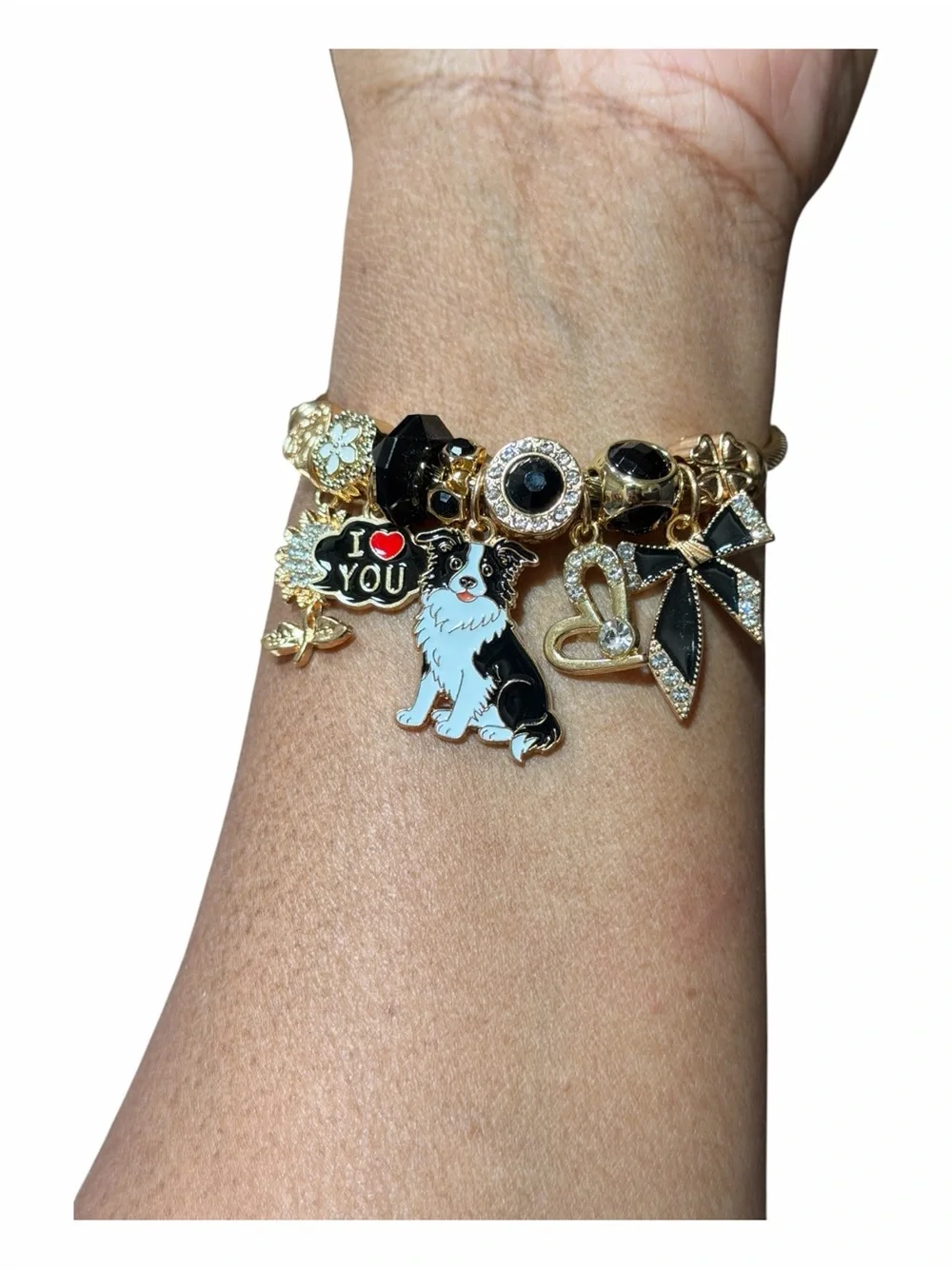 Gold Tone Charm Adjustable Twisted Bangle W/Black & White Dog and Heart Charms